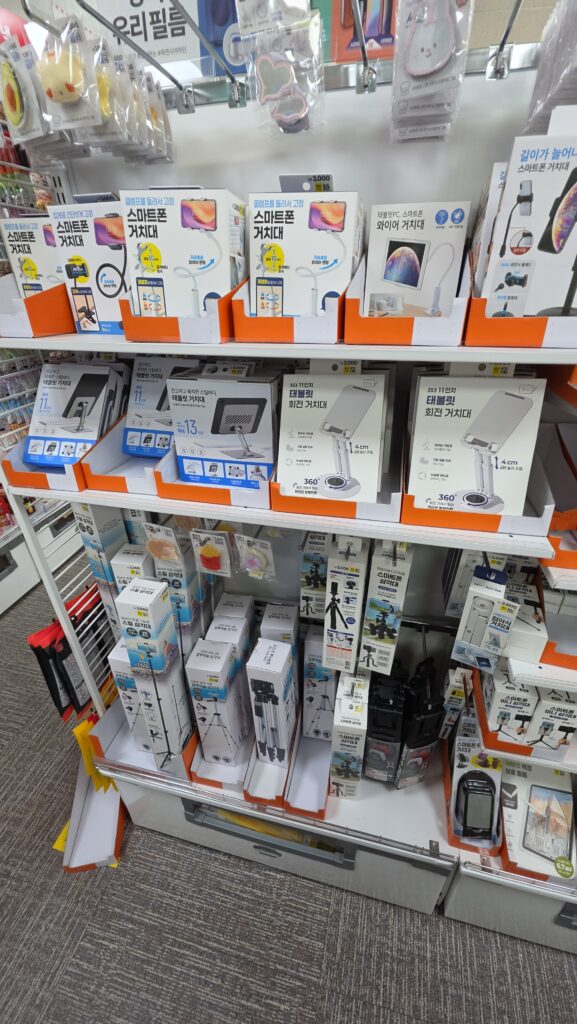 Smartphone and electronic device accessory display stand at Daiso Korea
