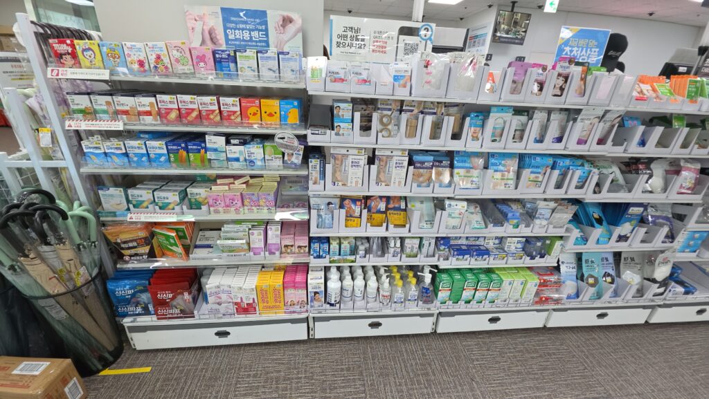 Display stand of disinfectants, disposable bandages, alcohol swabs, contact lens solution, etc. at Daiso Korea