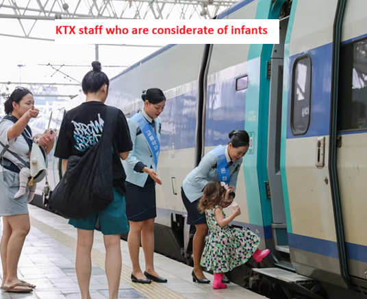Kind and gorgeous KTX STAFFS help a child passenger to board the ktx train