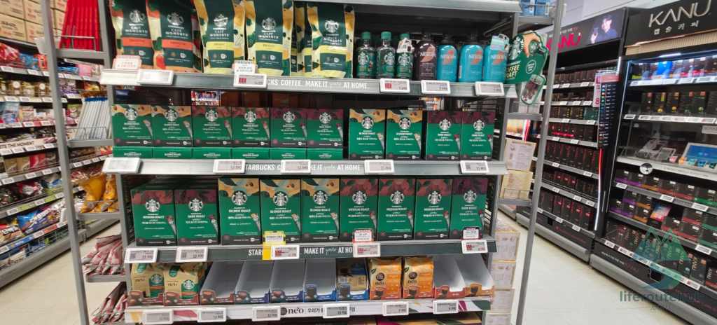 Korean Grocery Store 101: How to Shop at E-mart in South Korea Starbucks coffee and various other coffees on the shelves of E-mart stores
