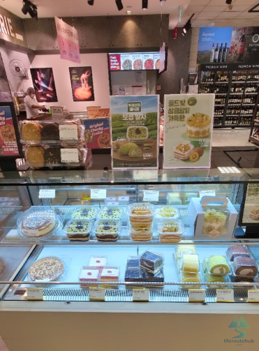 Korean Grocery Store 101: How to Shop at E-mart in South Korea Roll cakes and bread on the E-mart store shelves