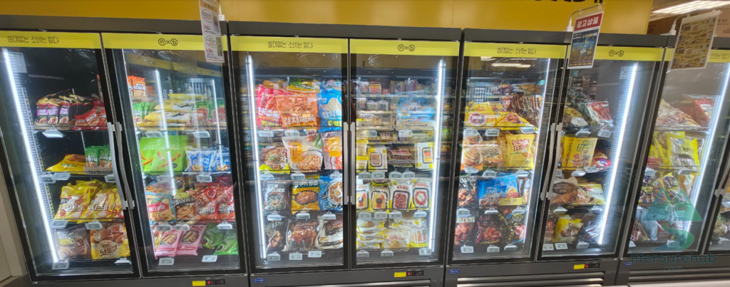 Korean Grocery Store 101: How to Shop at E-mart in South Korea Instant foods and dairy products such as tteokbokki, fish cakes, and milk on E-mart store shelves